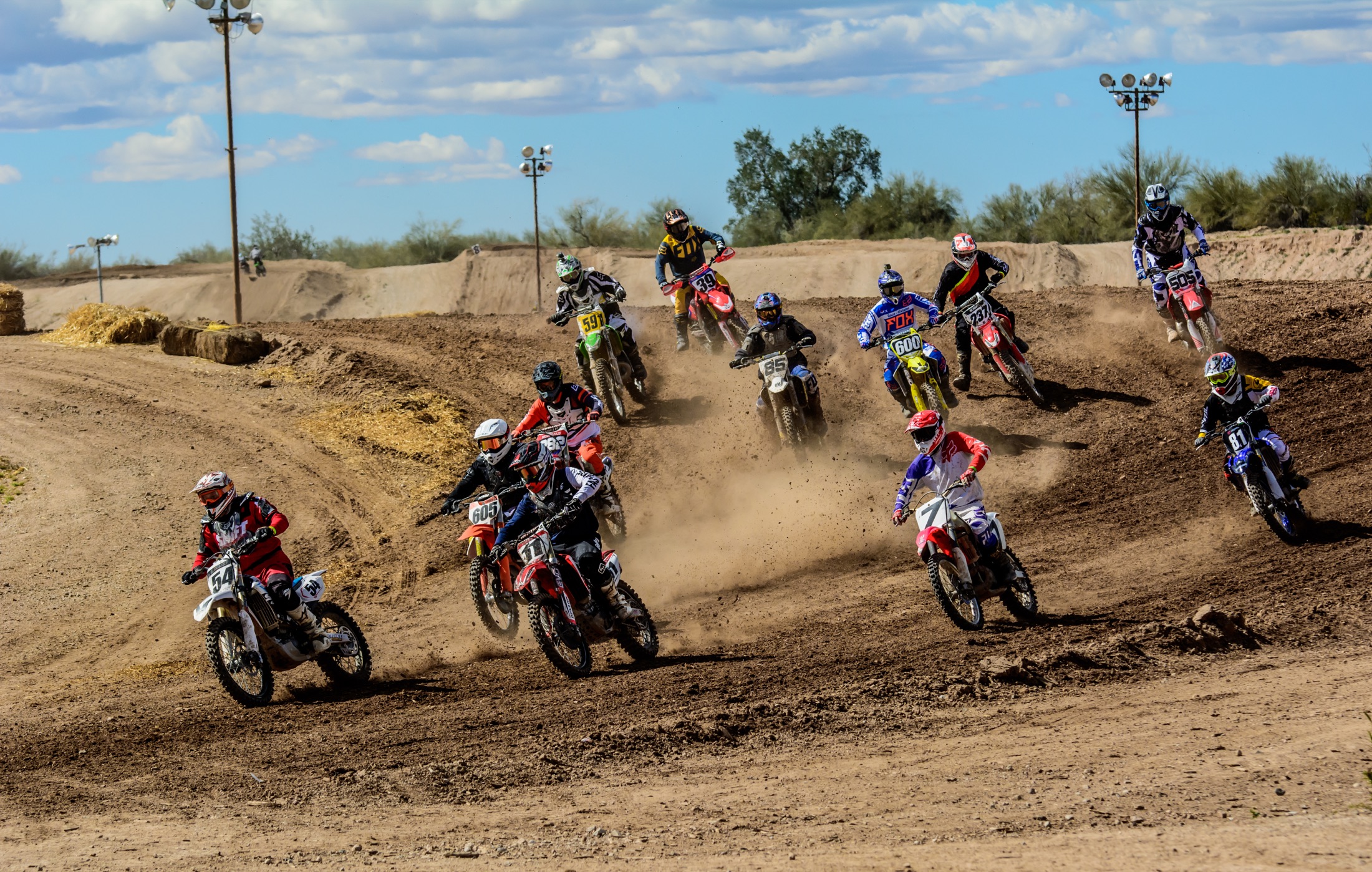 Riders racing on the SMX/Vet Track at Arizona Cycle Park